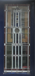 908039 Afbeelding van een Domtoren (?), uitgevoerd in glas-in-lood, in de etalage van Tweelingglas (Oudenoord5) in de ...